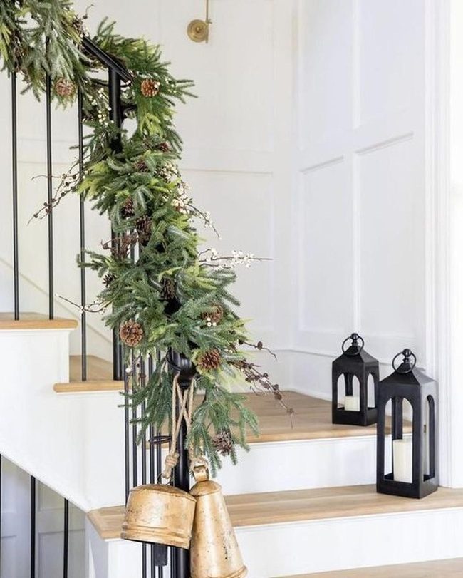 Green Garland Black Railings White Walls