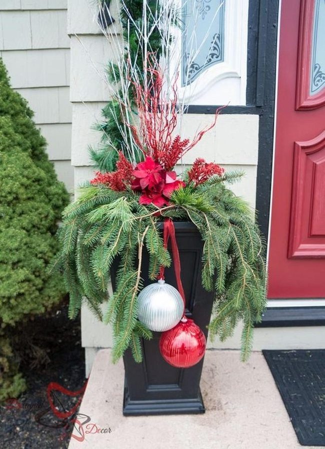 Red Ornaments In Black Planter
