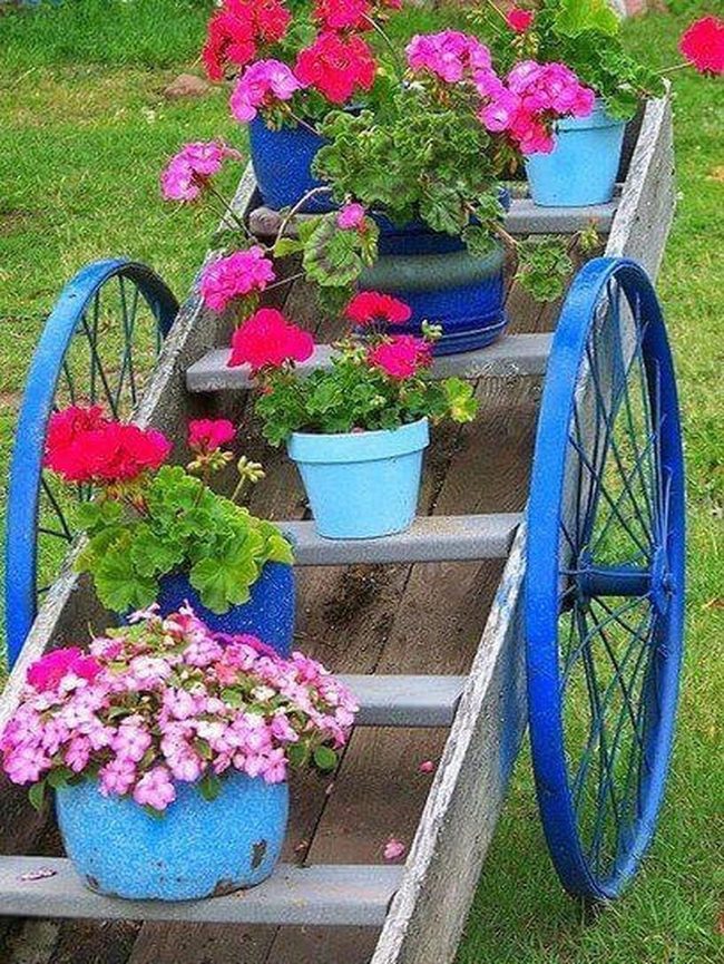 Blue Cart Spilling Flowers
