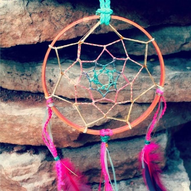 Pink-Feathered Dreamcatchers On Stone