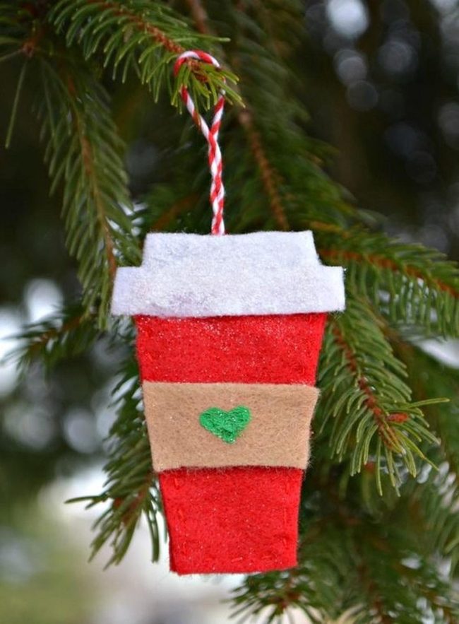 Red Ceramic Cup On Evergreen