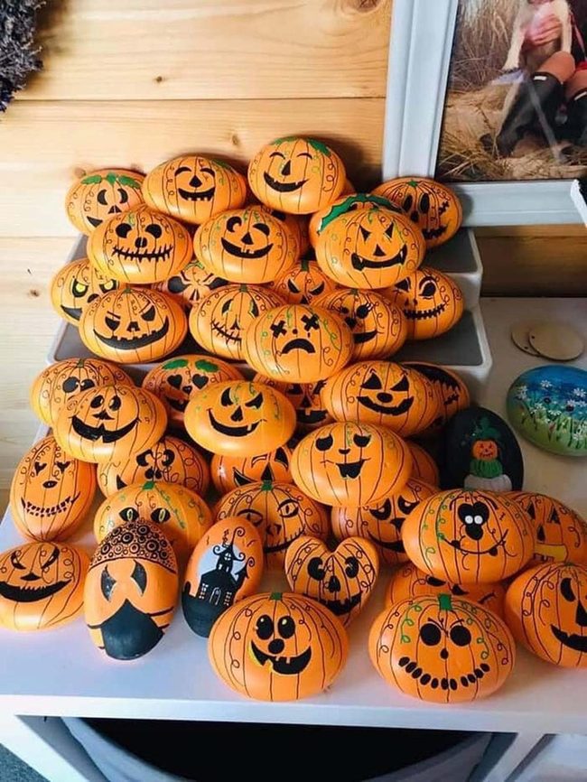 Orange Hand-Painted Pumpkins And Stones