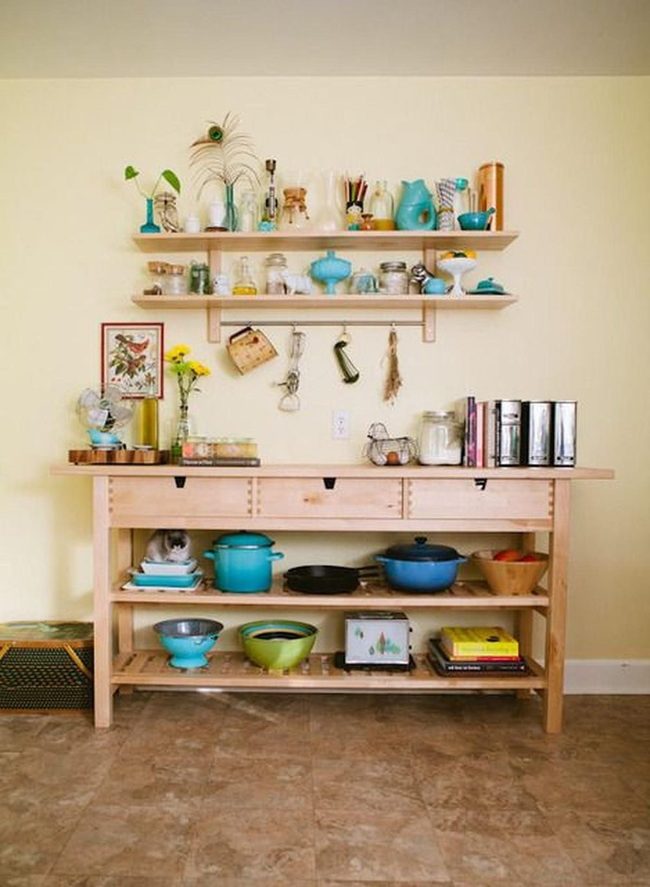 Yellow Kitchen With Blue And Green Pottery