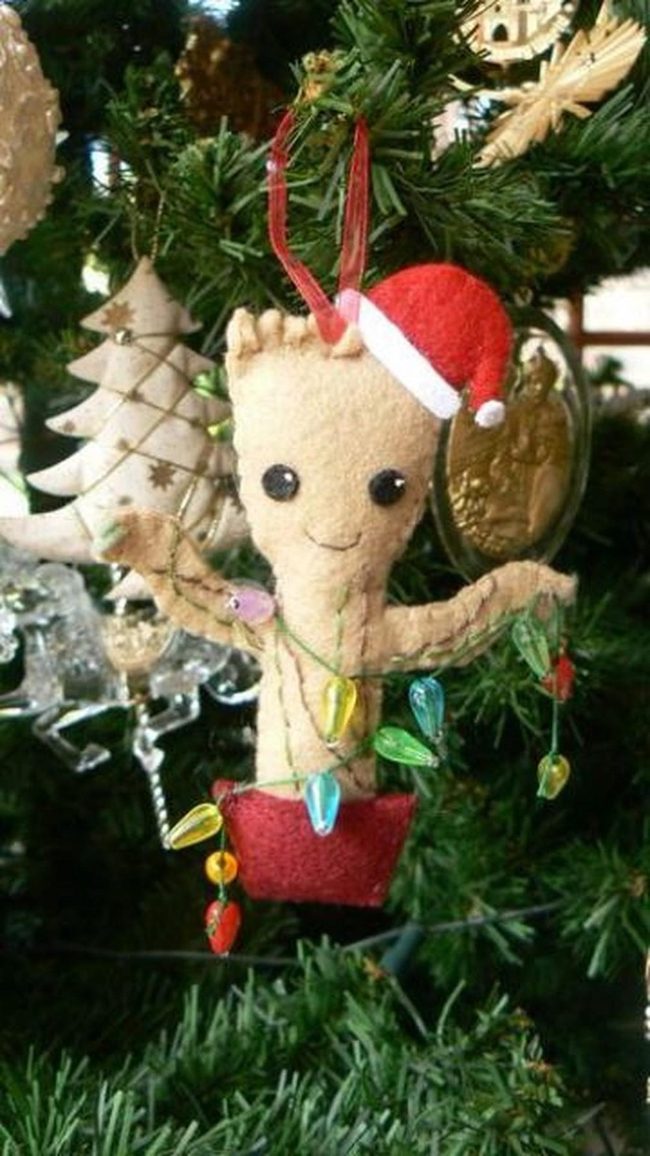 Green Branches, Colorful Lights, Smiling Ornament