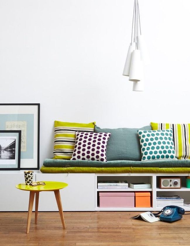 Striped Cushions And Yellow Tables