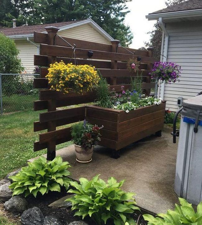 Brown Wood Screen With Living Planters