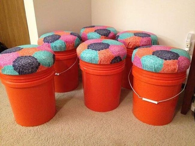 Orange Bucket Seats With Floral Cushions