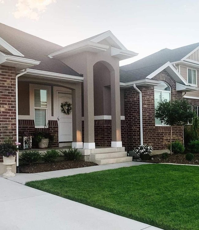 Gray Stucco Gabled Entry