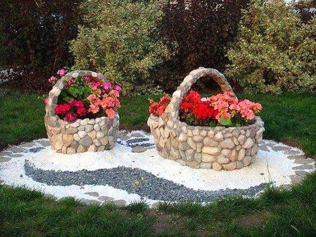 Stone Baskets Overflowing With Flowers