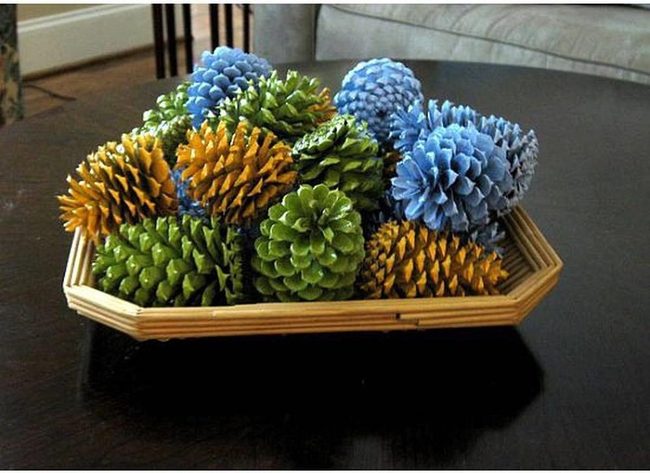 Colorful Pinecones On Wood