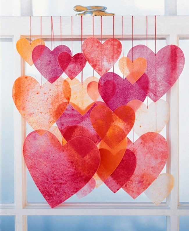 Sunlit Paper Hearts Against Blue Sky