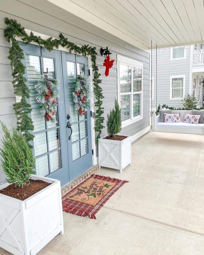 Light Blue Doors With Flocked Wreaths