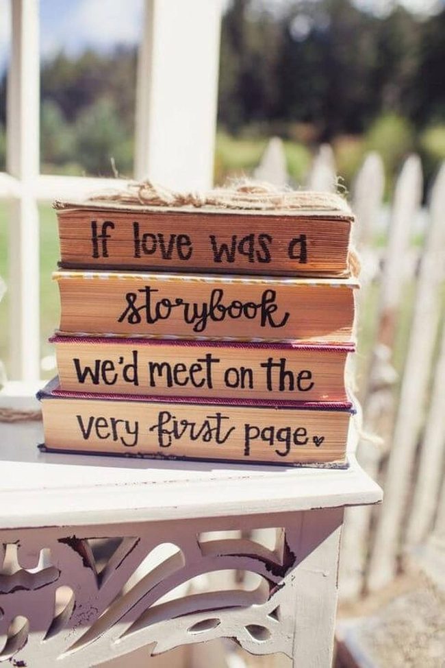 Pastel Book Stack With Handwritten Stories