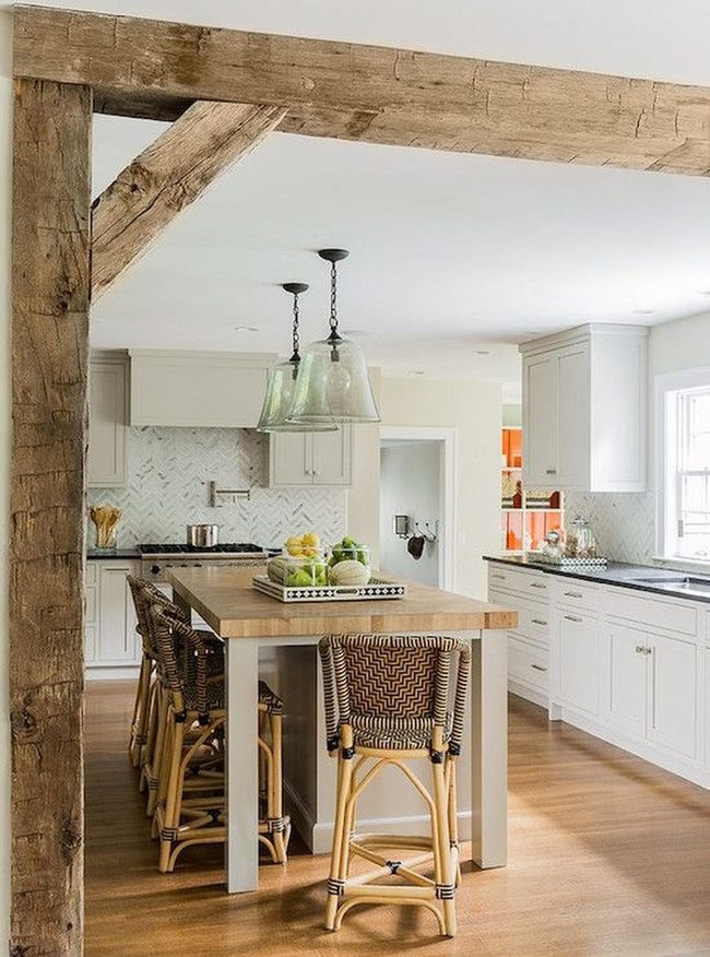 Wooden Island Kitchen With Sunlit Windows