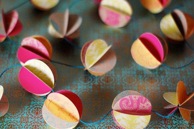 Colorful Paper Circles On Blue Strings