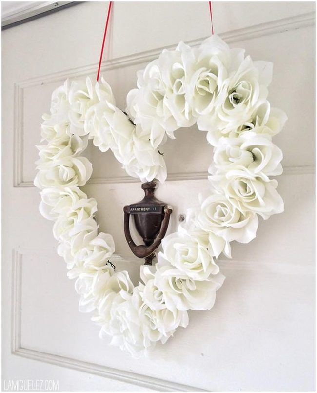 White Floral Heart With Red Ribbon