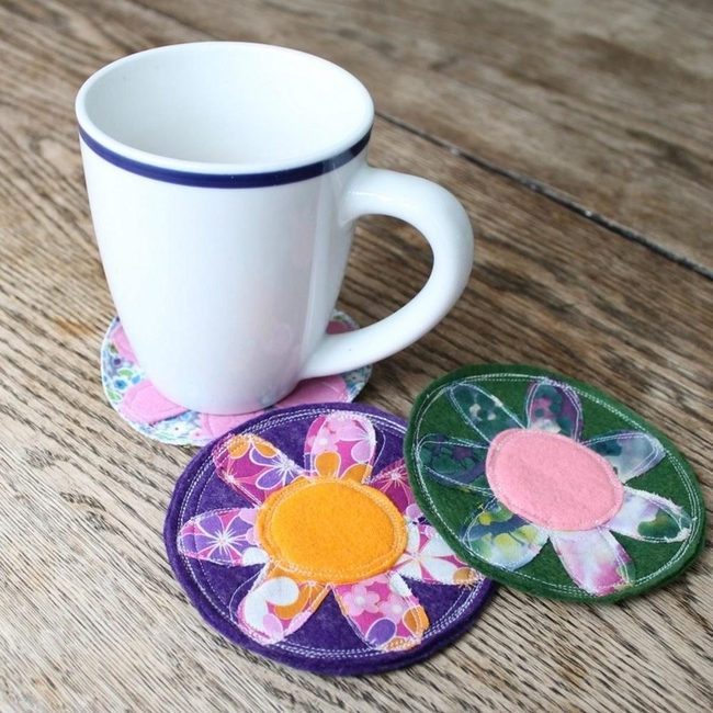 Purple Petals Orange Centers Fabric