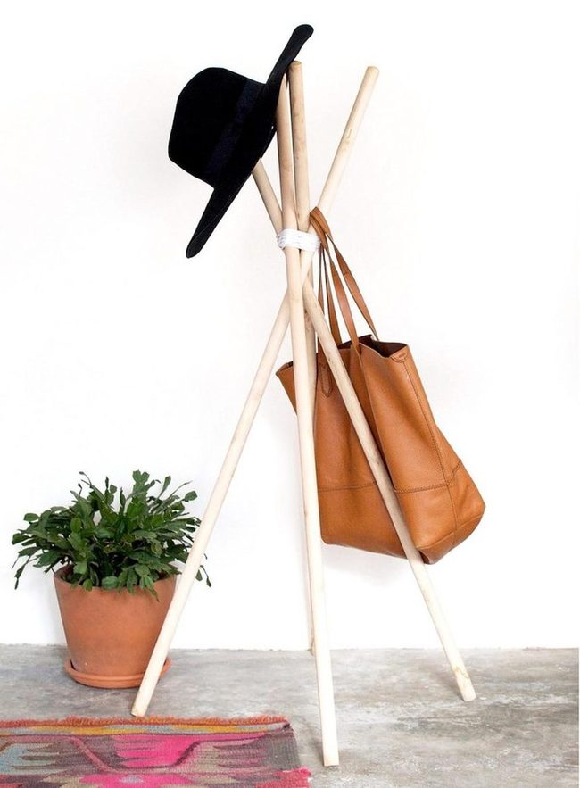 Wooden Poles, Black Hat, Brown Leather