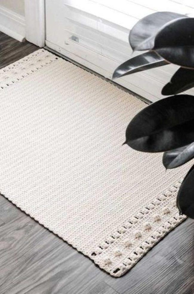 White Woven Rug, Dark Wood Floors