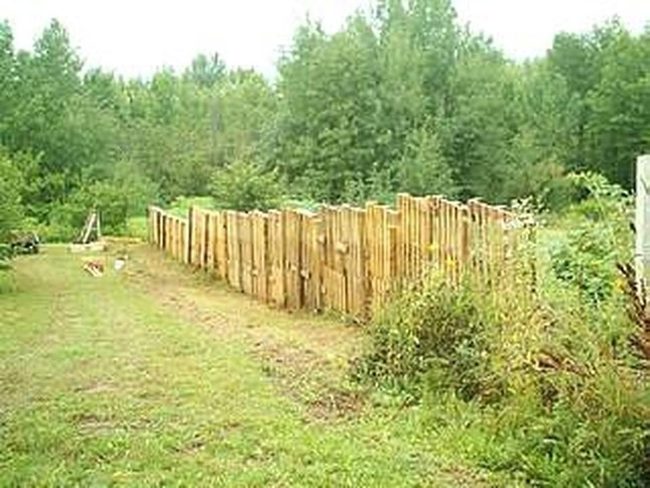 Rough Log Fence Green Sanctuary