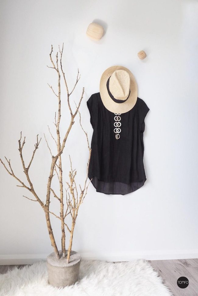 Black Dress, White Walls, Maximum Impact