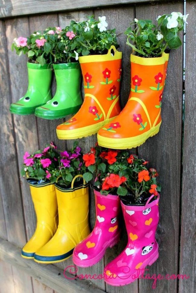 Booted Flowers On The Fence