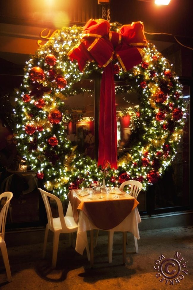 Red Wreath Gold Bow Candlelit