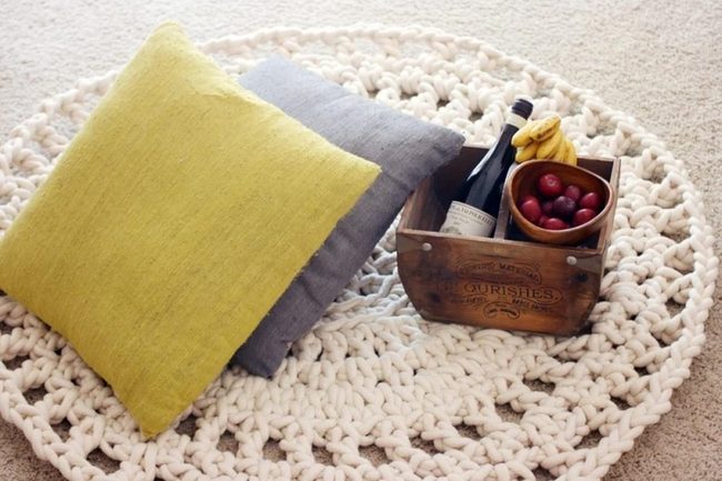 Knit Rugs And Gray Pillows
