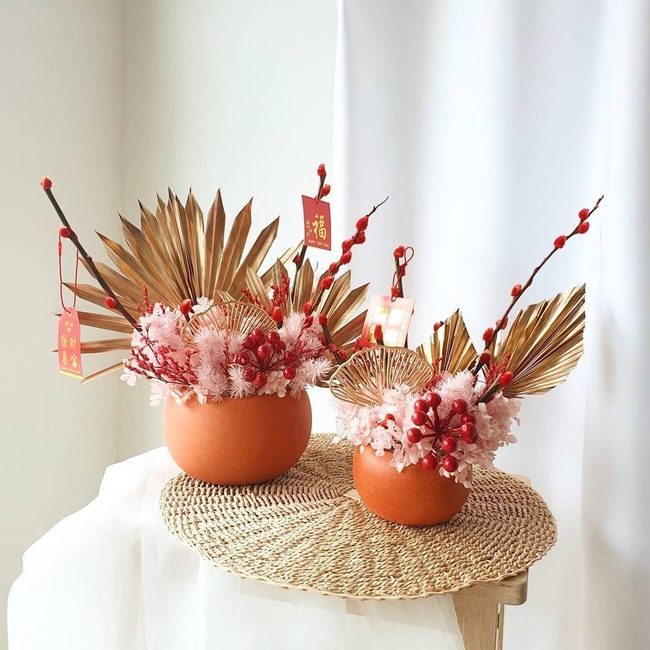 Dried Botanicals In Earthy Vessels