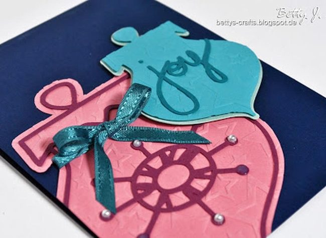 Pink And Blue Ornaments On Black