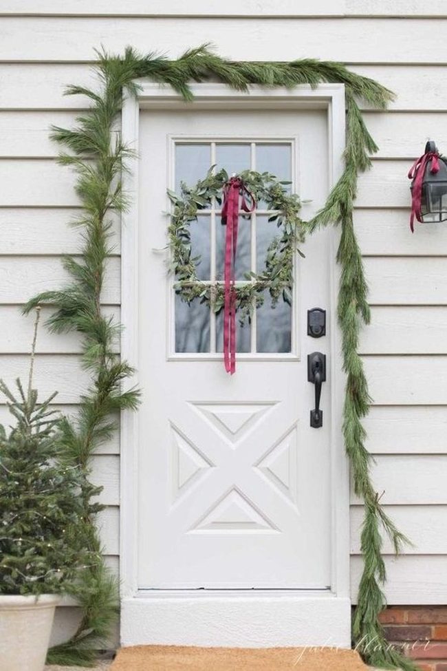 Green Wreath, White Door, Red Ribbon