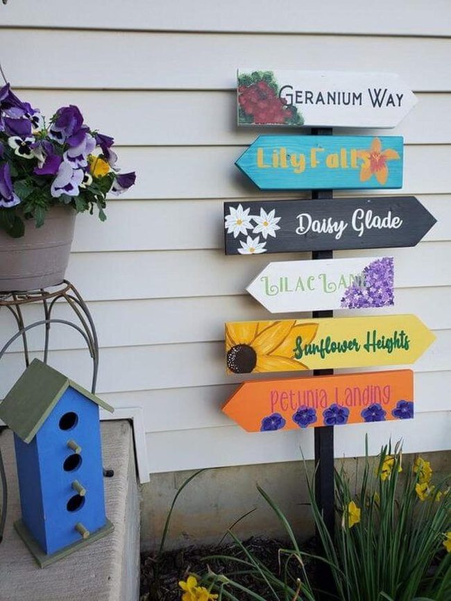 Colorful Signs Guide Blooming Garden