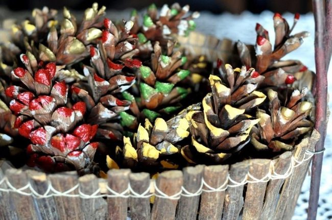 Painted Pinecones In Woven Basket
