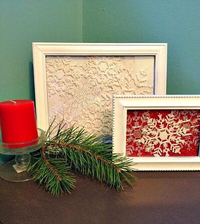 Framed Snowflakes Behind Glass
