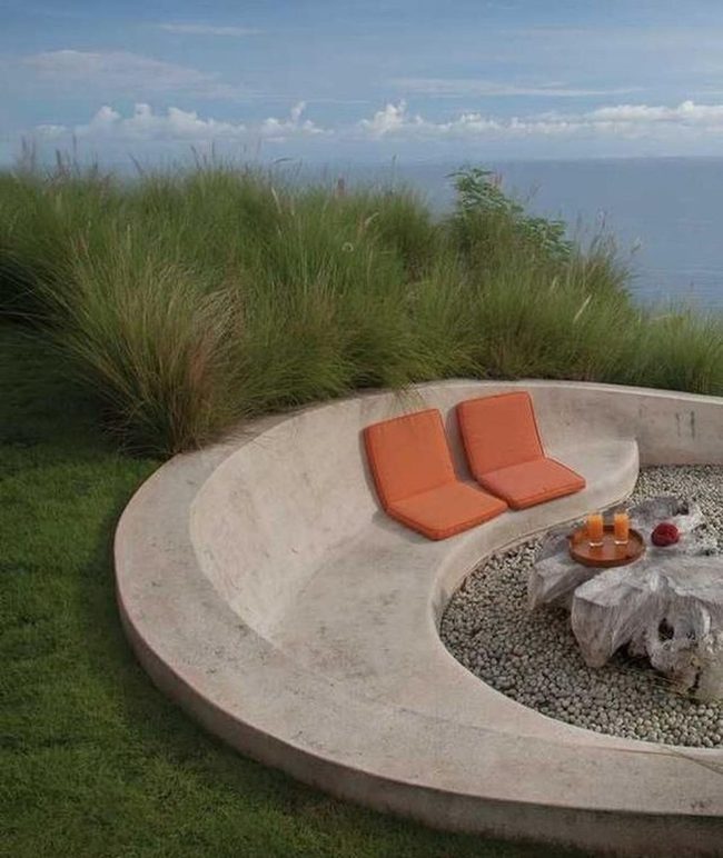 Orange Cushions Meet Concrete Curve