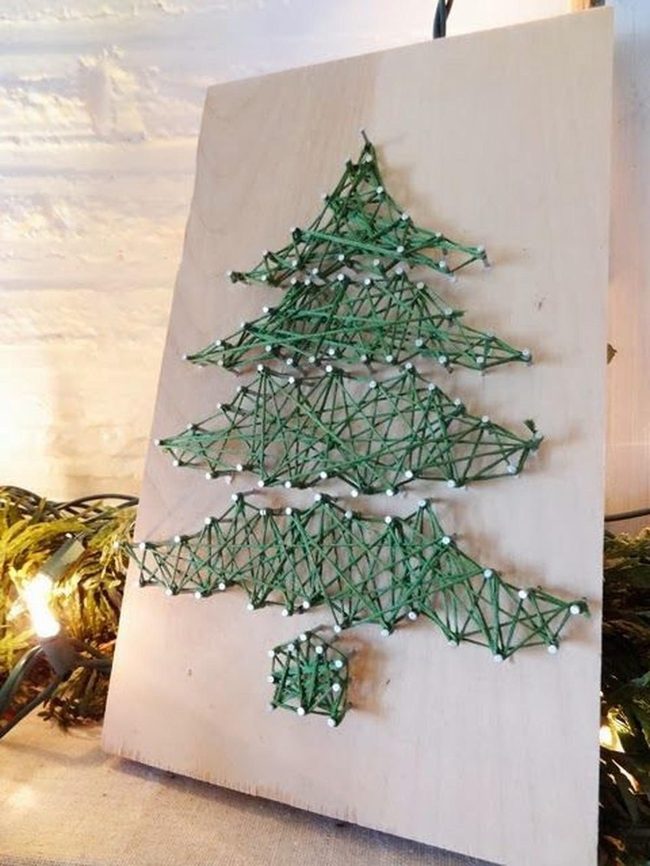 Green String Tree On Light Wood