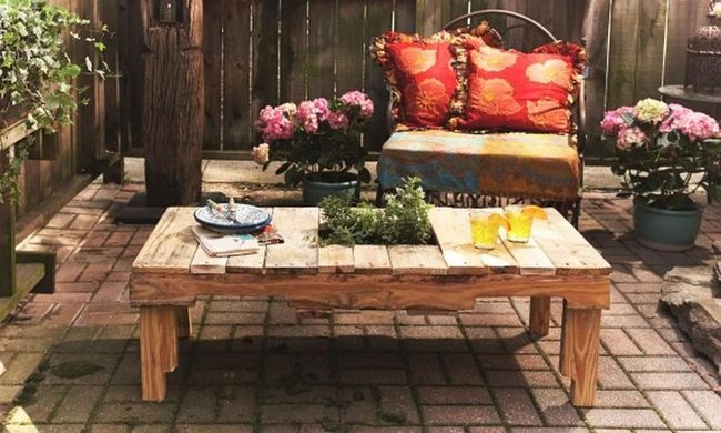 Red Pillows Brighten Wooden Patio