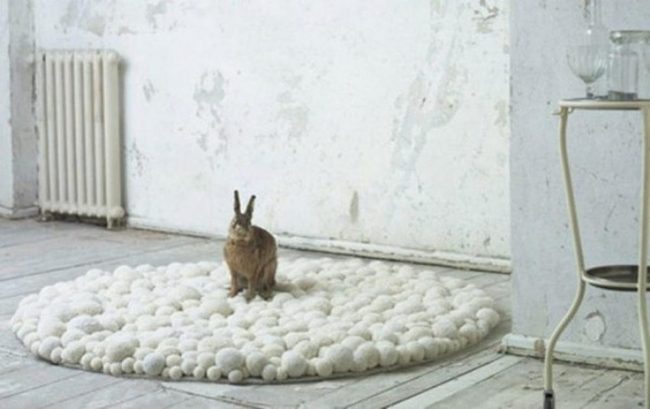 Brown Rabbit On White Wool