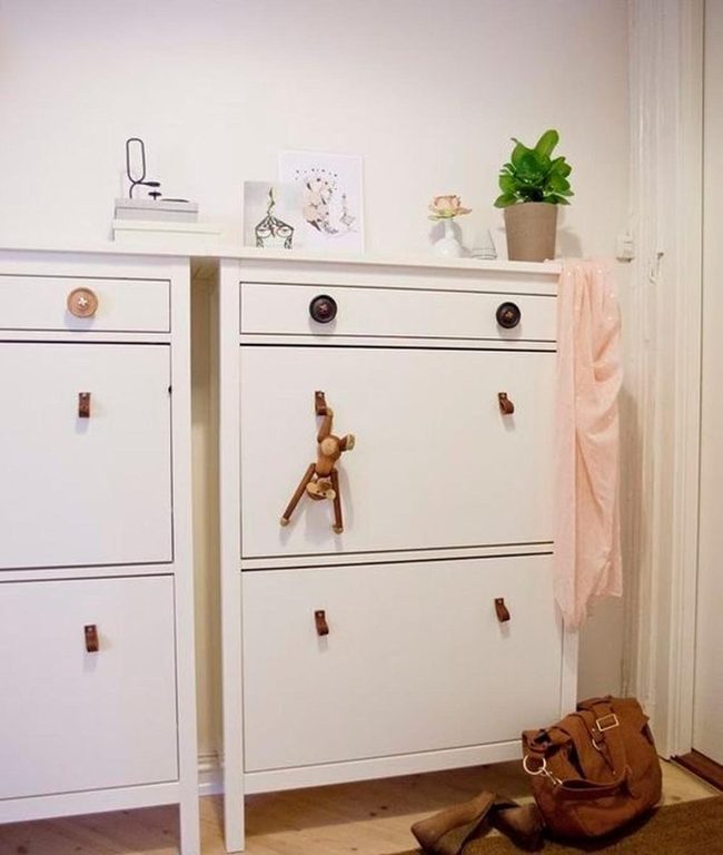 White Cabinet, Green Plants, Pink Accent