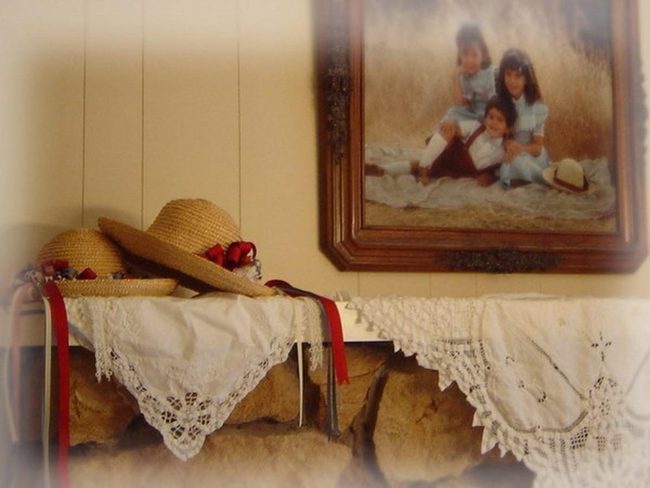 Stone Fireplace, Wooden Walls, Straw Hats