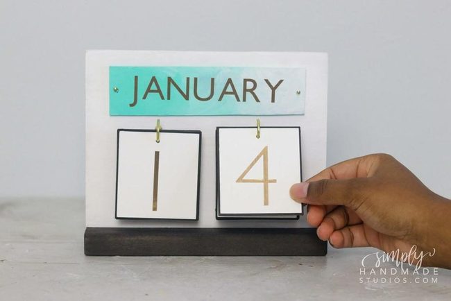 Modern Wooden Calendar With Gold Accents