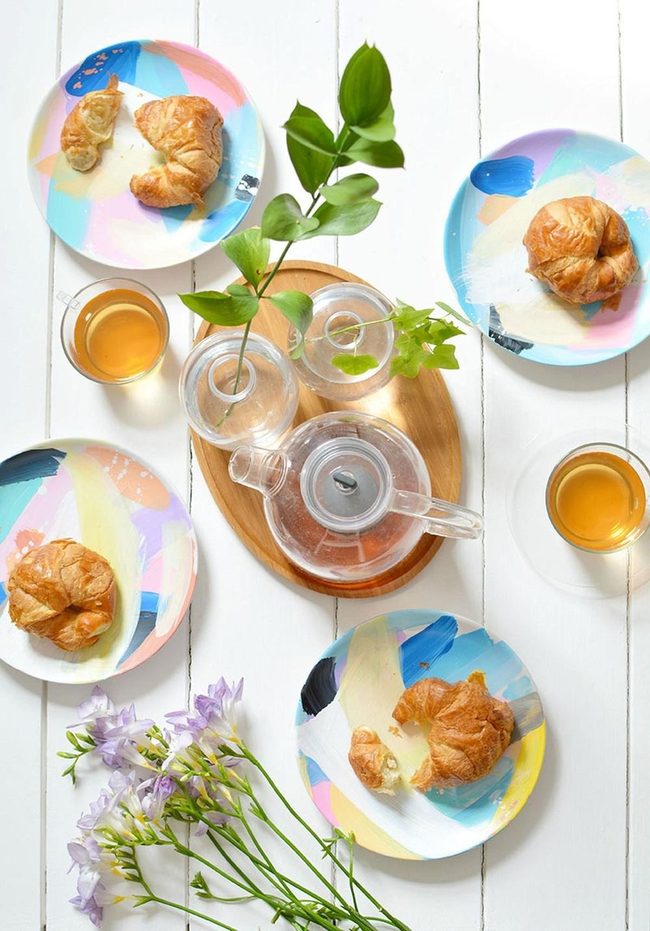 Golden Pastries On Patterned Plates