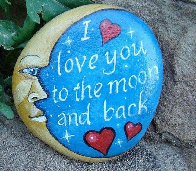 Blue And Gold Painted Stone Faces