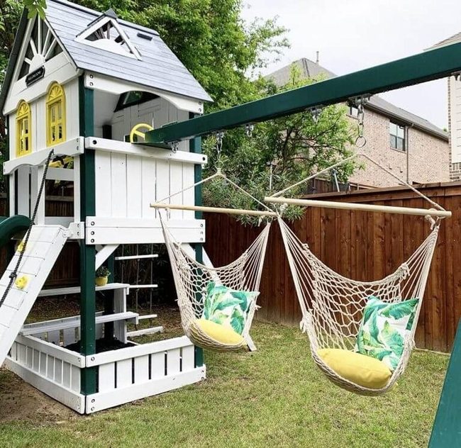 Backyard Mansion With Swings