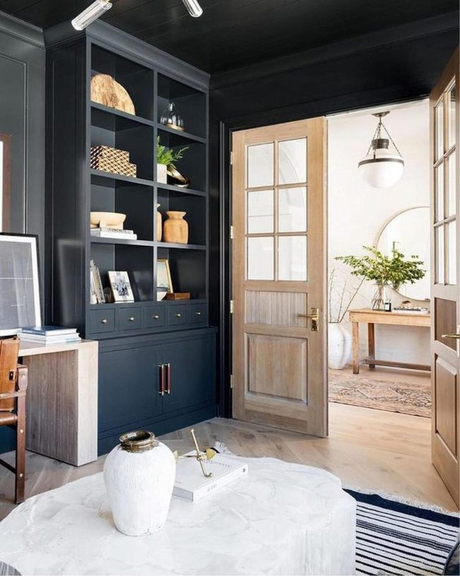 Dark Wood Shelves With White Centerpiece