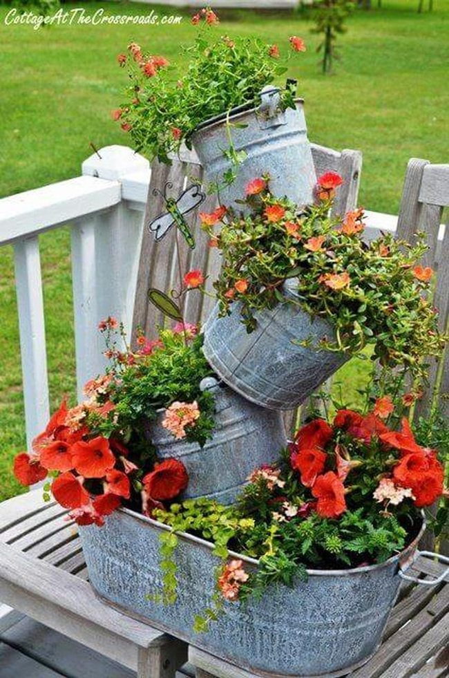 Stacked Metal Bucket Tower