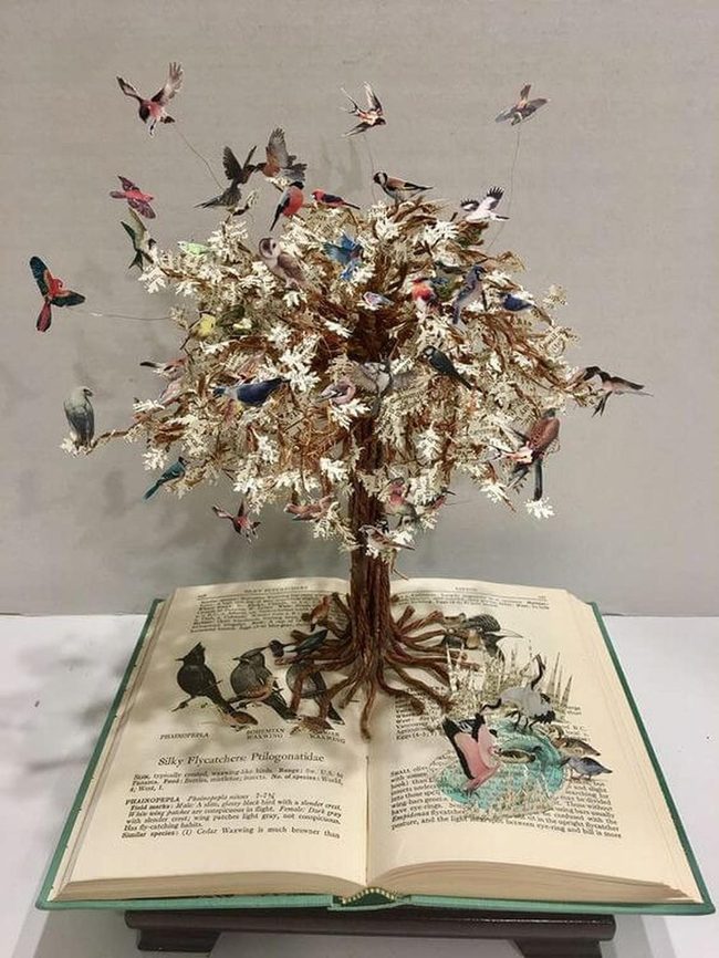 Paper Tree Rising From Pages