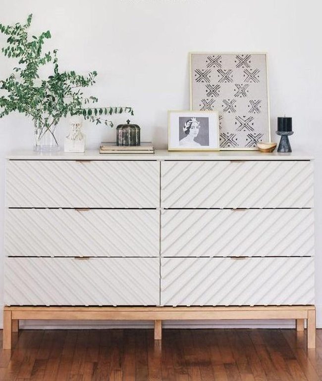 White Grooved Dresser With Wooden Base