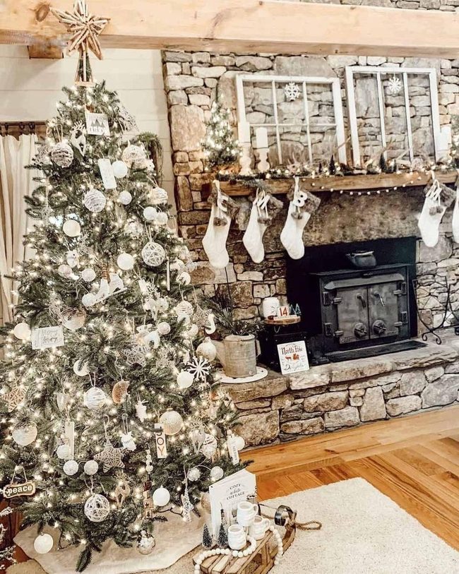 Snowy Corner Tree With Gray Stone Fireplace