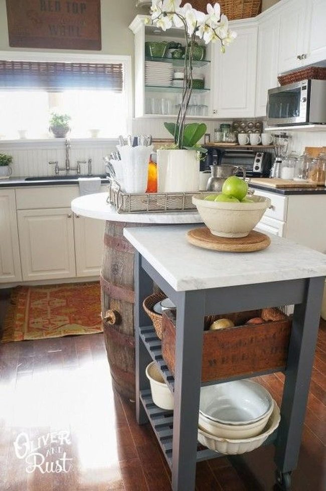Sunlit White Kitchen With Green Accents